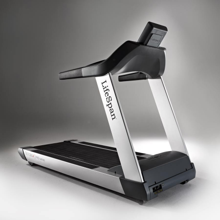 User folding up treadmill
